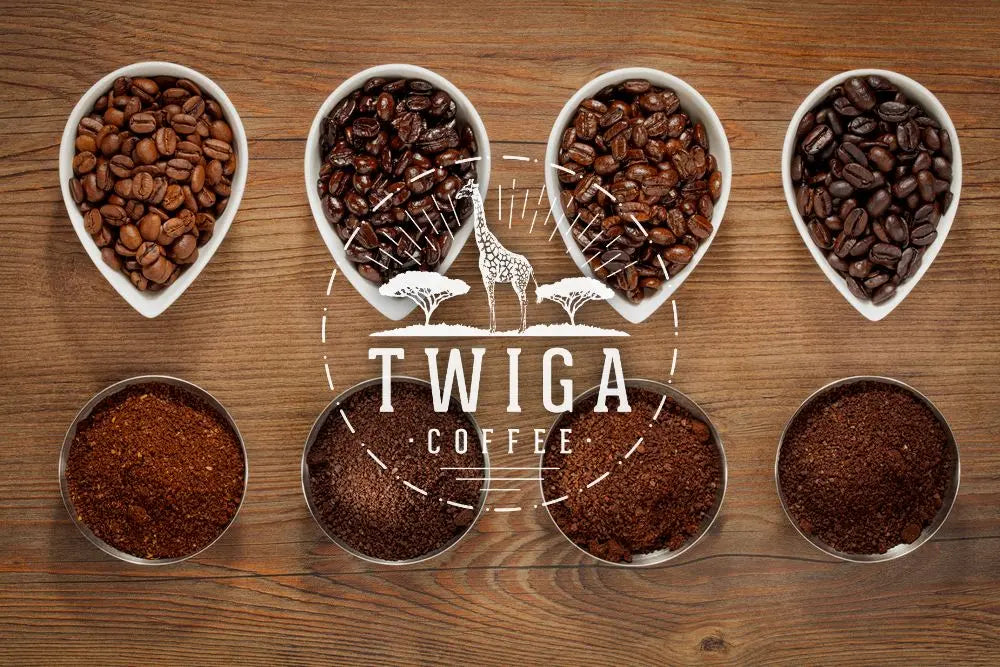 Overhead view of four dishes of whole coffee beans at different roast levels above four tins of ground coffee.